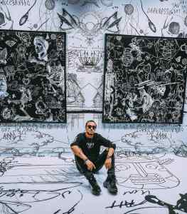 How do you like the feeling of my black paintings on this special white wallpaper and matching floor?
