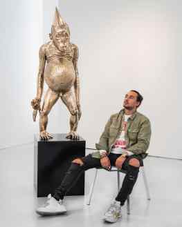 This sculpture titled “Birthday Suit” gets it’s origin from my gorilla head sculpture “Big Bang”&nbsp; that piece was received so well that I wanted to experiment further with the theme of monkeys.. so I went for a full body to see if I could convey extra emotions and add humor to the sculpture by making him naked with a bunch of roses.He feels like he is late to the party.. like people can often feel when they “miss the boat” on something