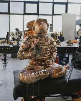 the space traveler is a pioneer of new frontiers, of new worlds and a guide pointing towards unknown future.