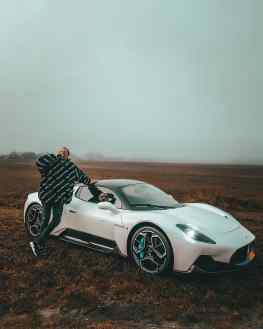 There are two types of people in this world.. Those that pose next to a cool car …and those that pose next to a cool car with a poodle locked inside🐩