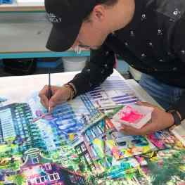 Here i’m painting 🍭fluorescent pink on one of my city portraits from #amsterdam called “Harbour of Hope# 🙏🏻can you recognize some well know buildings?💜 #art #josephklibansky #artlover #painting #contemporaryart #modernart