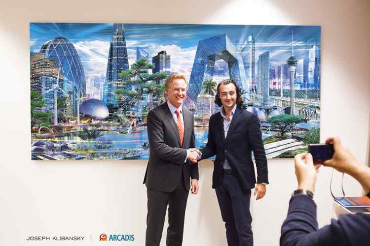 Joseph Klibansky shaking the hand of Niel McArthy (CEO Arcadis NV) - ARCADIS N.V. commisions Joseph Klibansky for 125 year anniversary