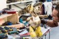 Working on the small Bare Hug in the studio - Bare Hug (polished bronze), 2016 by Joseph Klibansky