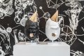 Black and White (small) Big Bangs next to each other. - Big Bang (painted bronze, black), 2016 by Joseph Klibansky