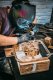 Studio assistant working on Elements of Immortality in the studio - Element of Immortality (polished bronze), 2018 by Joseph Klibansky